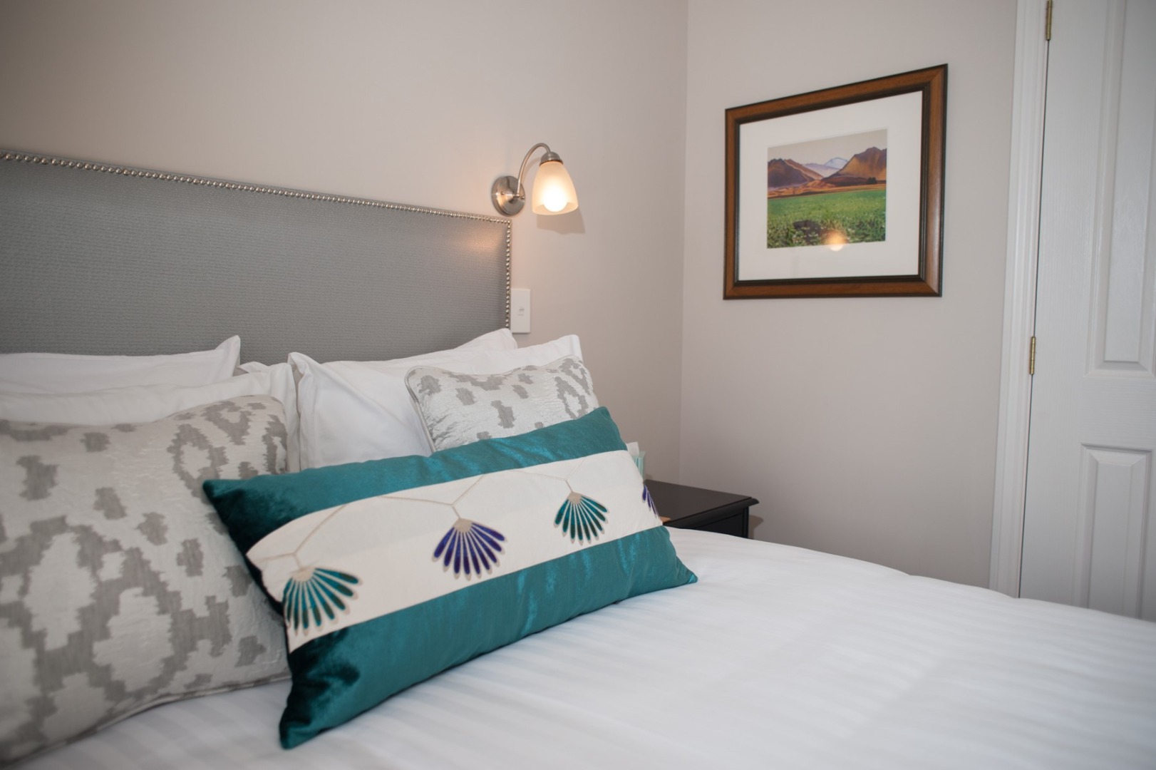 Bed with puffy cushion.jpg